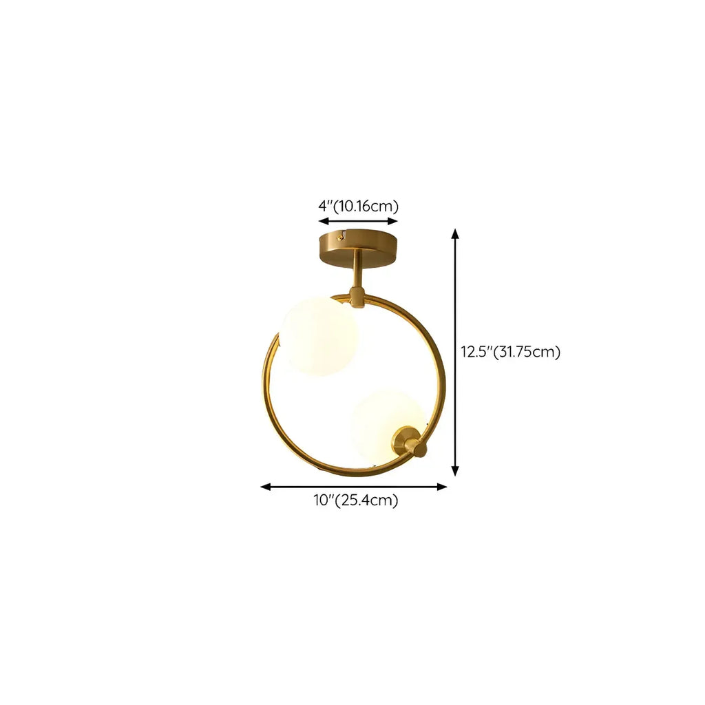 Plafonnier semi-encastré moderne en verre, métal doré et globe.