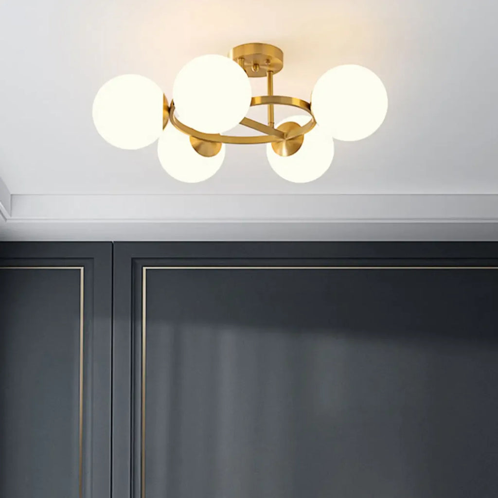 Plafonnier semi-encastré moderne en verre et globe doré à boucle