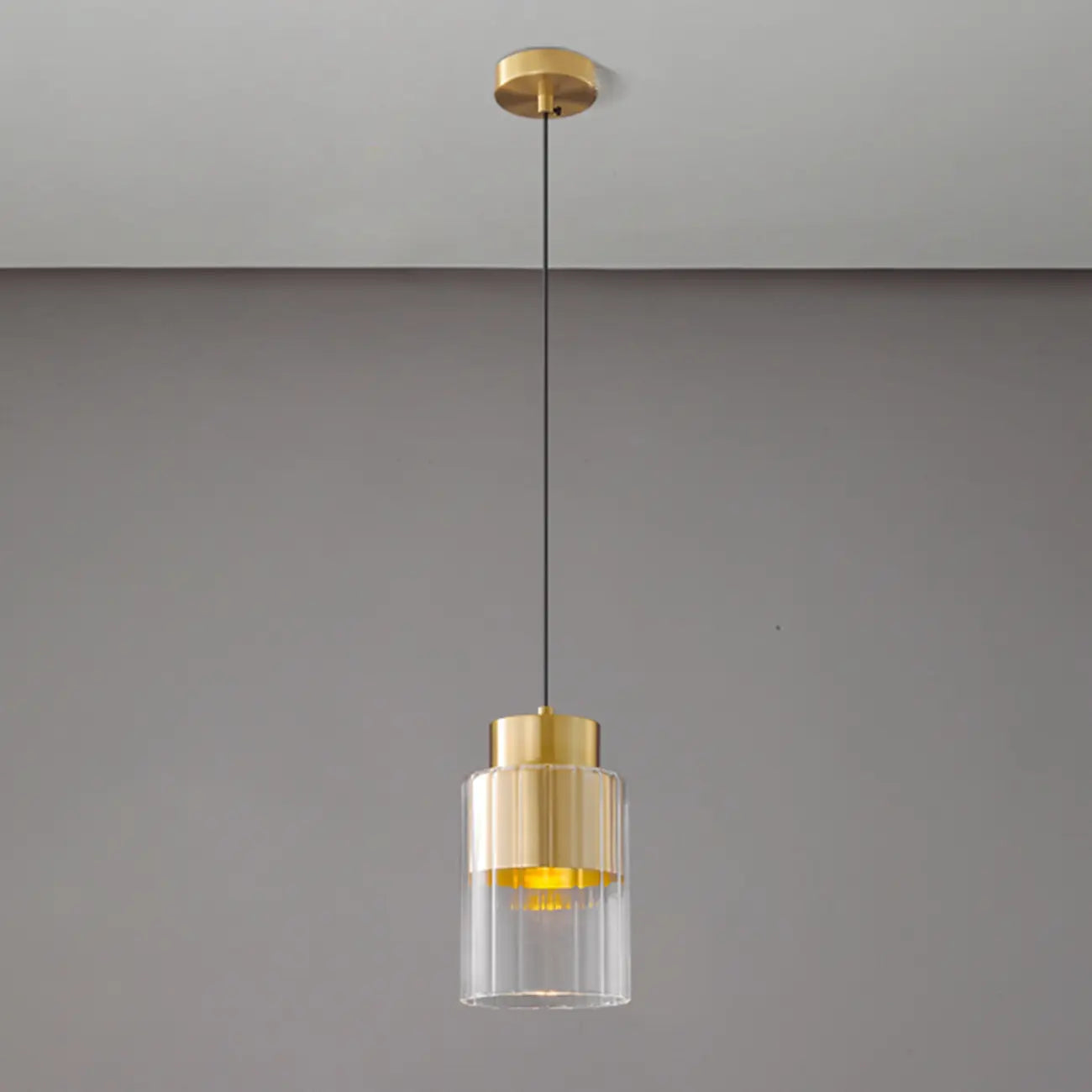 Suspension minimaliste cylindrique en laiton et verre transparent