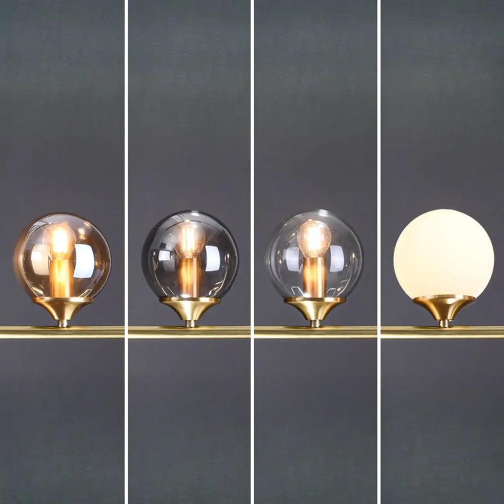 Salle à manger moderne avec suspension LED en laiton et verre pour îlot central