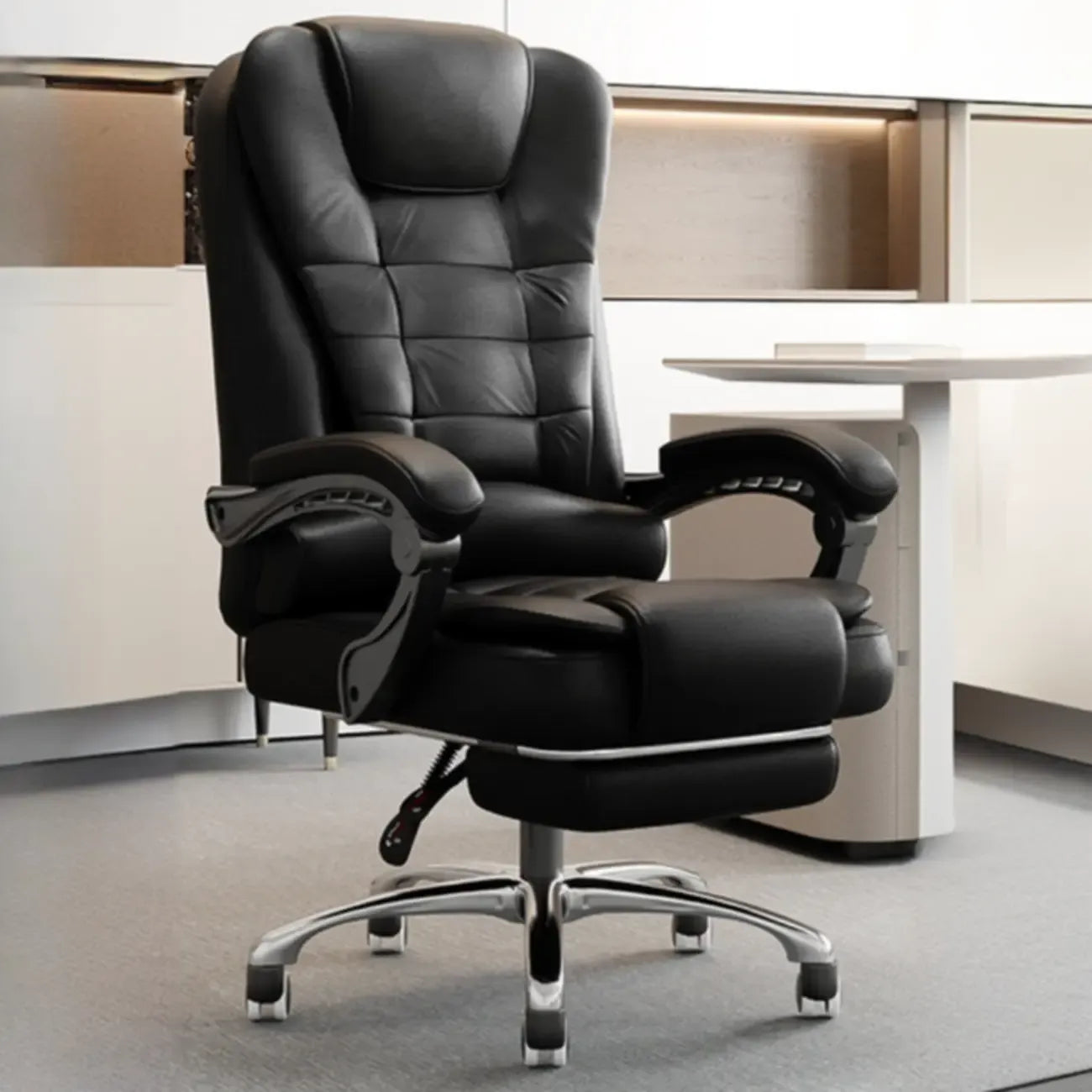 Fauteuil de bureau pivotant ergonomique en cuir noir avec repose-pieds