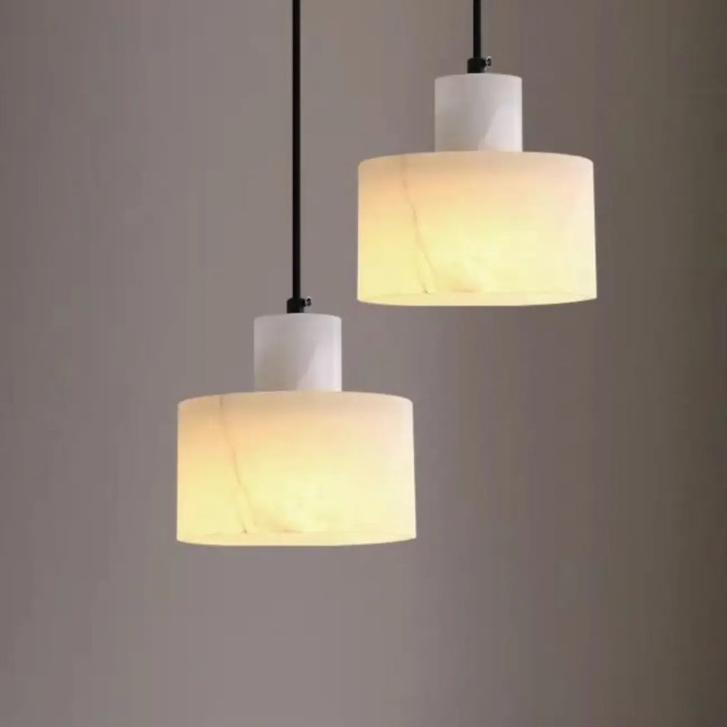 Suspension cylindrique en pierre noire