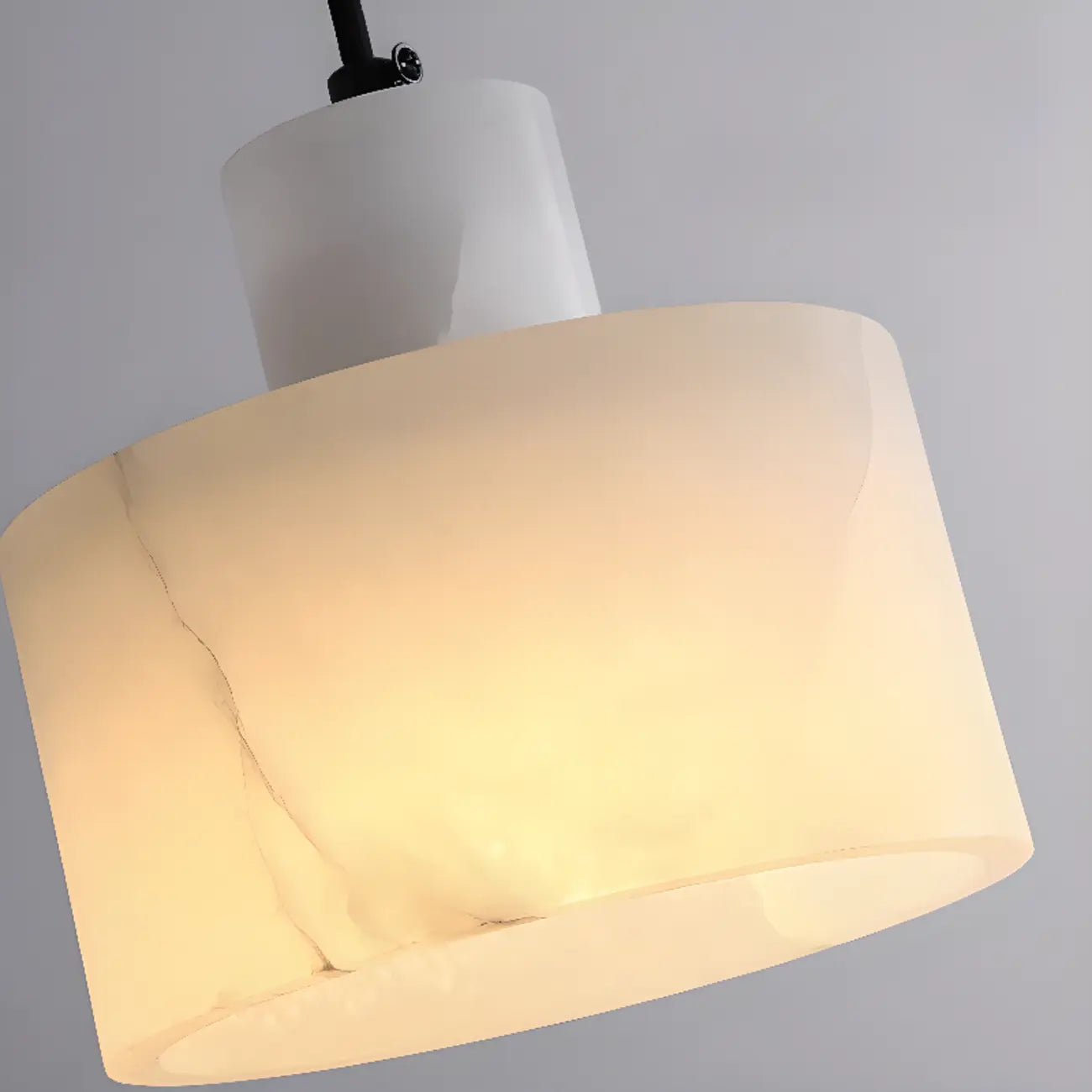 Suspension cylindrique en pierre noire