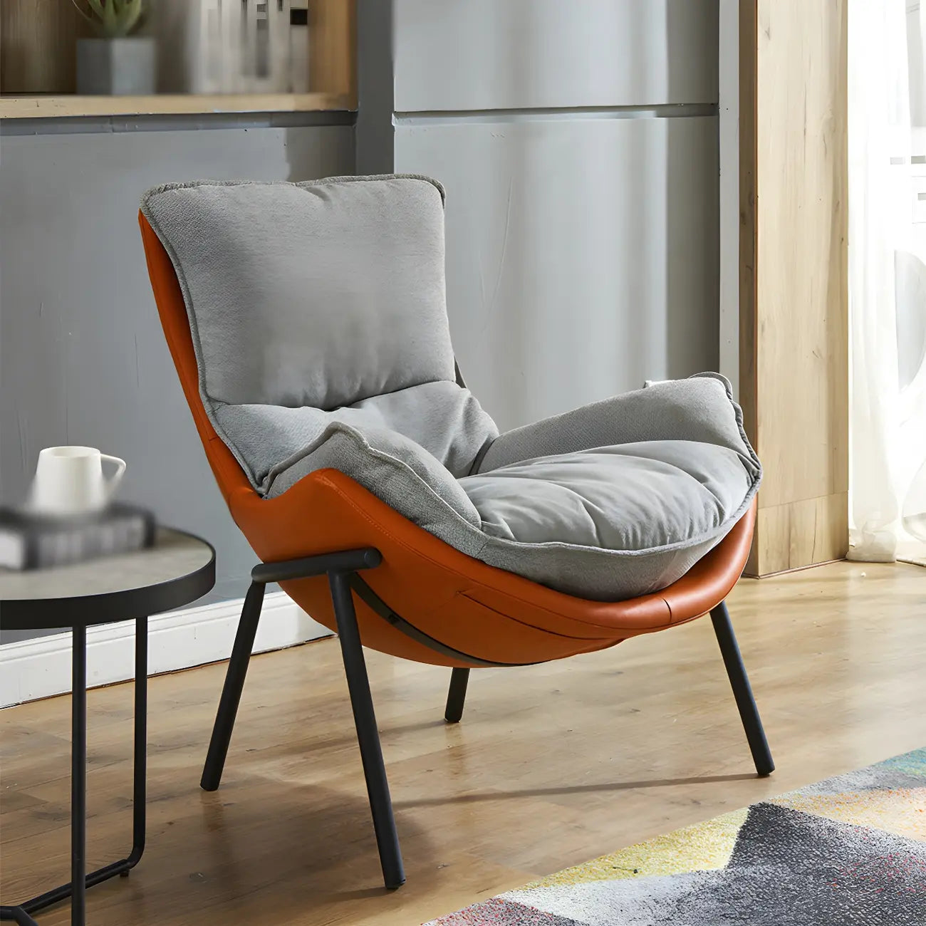 Fauteuil lounge moderne en tissu vert avec assise rembourrée