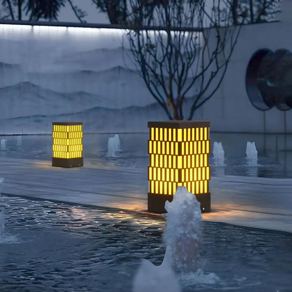 Culot de lampe rectangulaire à grille métallique noire et éclairage chaud