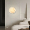Applique murale ronde contemporaine à LED beige effet pierre